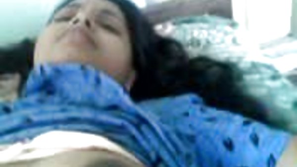 Mature blonde man sits on a street bench and gives him a blowjob